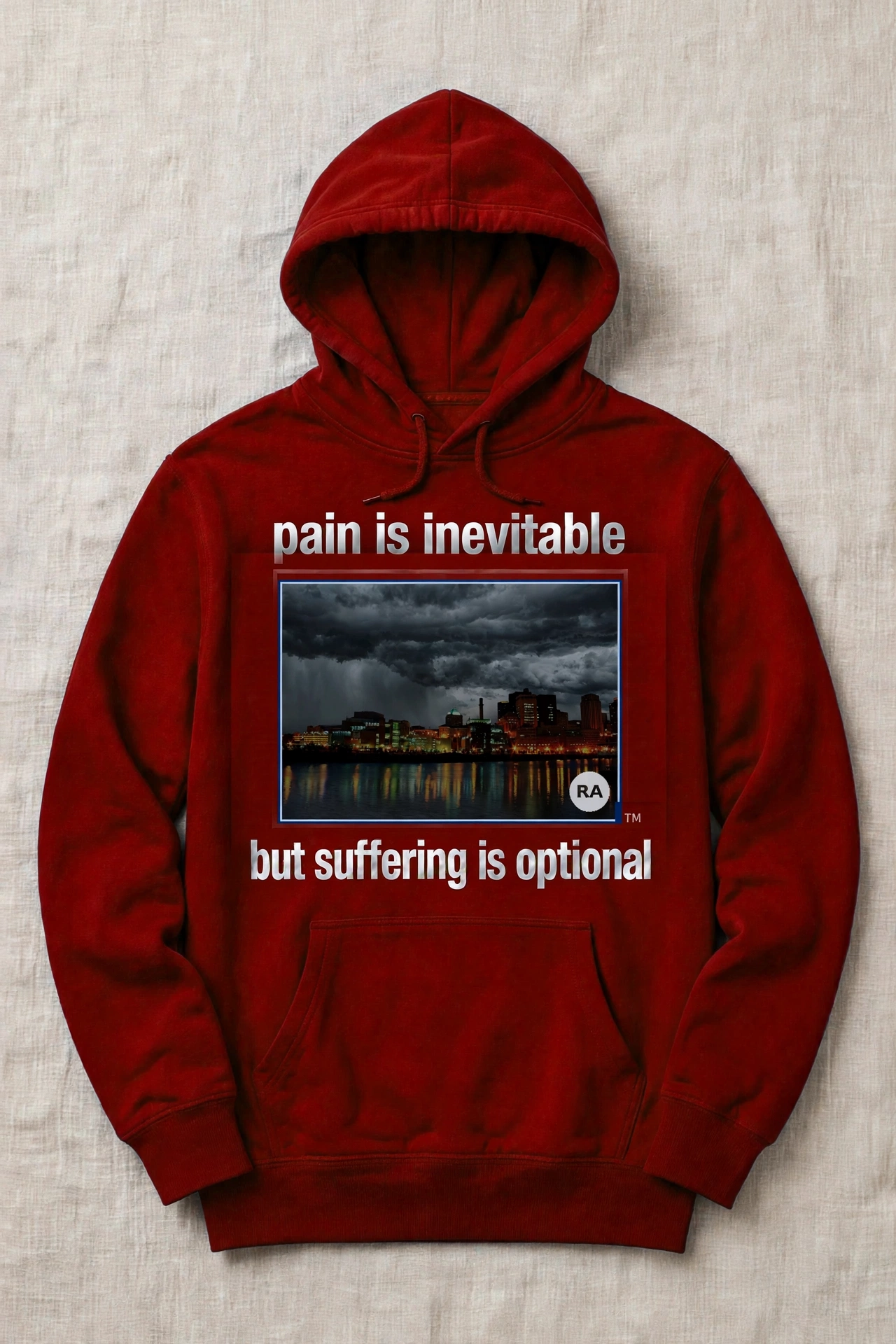 Red Pain Is Inevitable hoodie with a wide night view of the downtown Saint Paul riverfront and the words but suffering is optional