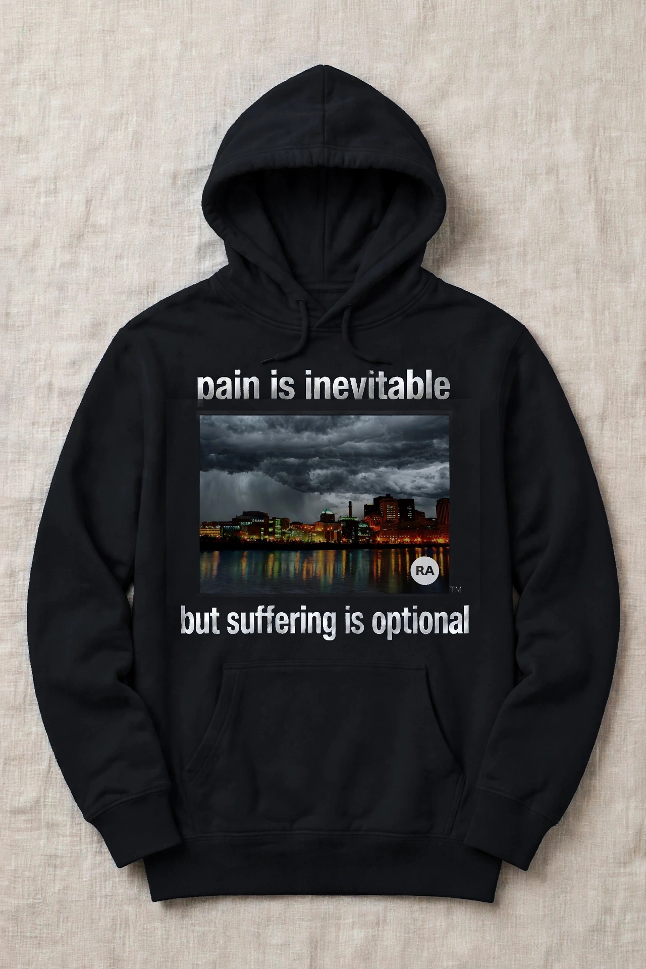 Black Pain Is Inevitable hoodie with a wide night view of the downtown Saint Paul riverfront and the words but suffering is optional